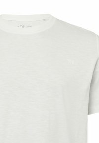 White short-sleeve cotton T-shirt with a crew neck and a subtle embossed logo on the left chest area. Smooth texture with a casual fit.
