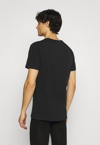 Björn Borg SOLID THOMAS TEE 2 PACK - Camisola interior - black beauty