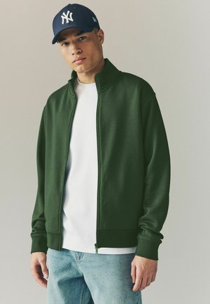 Jaka ar rāvējslēdzēju - green
