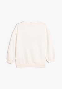 Sudadera blanca de algodón con mangas largas, puños y dobladillo acanalados. Textura suave y diseño sencillo, con un cuello redondo.