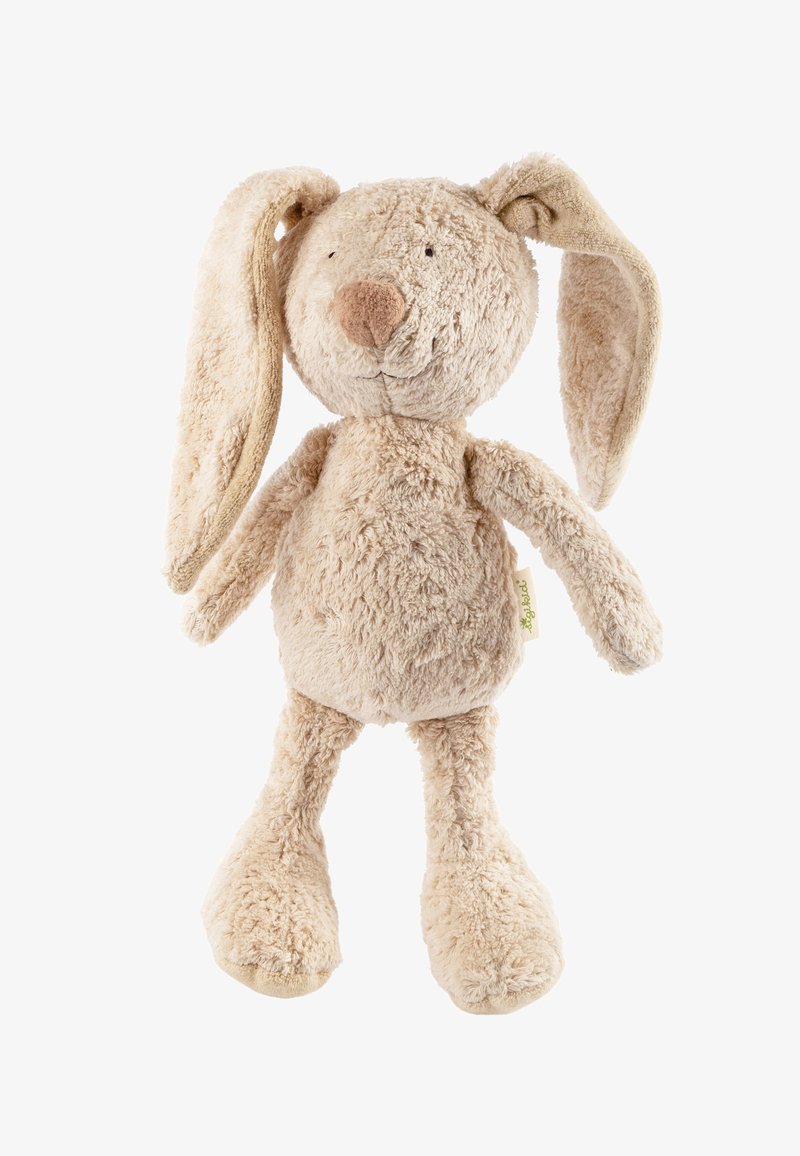 Plush rabbit toy in soft beige fabric with long floppy ears, rounded body, and stitched facial features. Tag on the side.