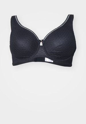 Melnas krūšturis ar stangām, ar teksturētu virsmu, kuram ir regulējamas siksniņas, neliels centrāls izmērs un kontrastējoša apdare gar malām.