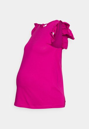 Haut de maternité rose vif sans manches avec détails volants aux épaules sur un fond uni.