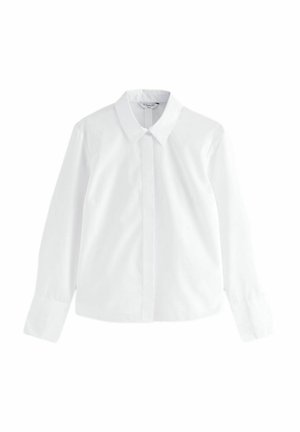 Chemise blanche à manches longues avec col, boutons cachés et poignets boutonnés, posée à plat sur un fond blanc.