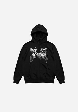 Schwarzer Kapuzenpulli mit Reißverschluss, zwei weißen Wolfsköpfen, die in entgegengesetzte Richtungen blicken, und dem stilisierten Schriftzug "WASTEDPARIS" auf der Brust.