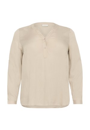Beige long-sleeve blouse in soft fabric, featuring a v-neckline, button placket, and cuffed sleeves with a rounded hem.