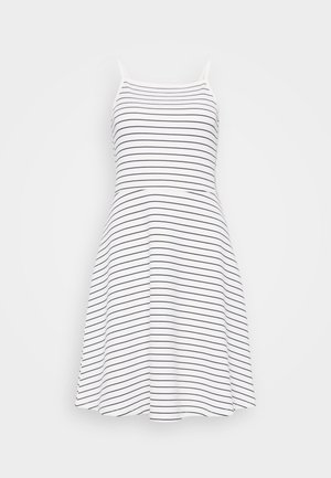 Stribet ærmeløs kjole i hvid og marineblå. En tætsiddende overdel overgår til en udsprunget nederdel. Fremstillet af blødt, letvægtsstof.