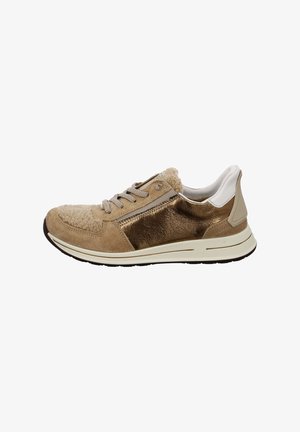 Beige suede sneaker with metallic gold side panels, textured wool-like toe, flat laces, and white accent at the heel. Rubber sole.