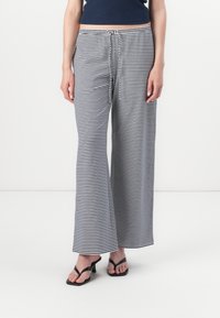 Hollister Co. MAY BAGGY PULL ON - Pantalones deportivos - dark blue/white