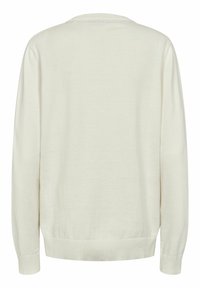 Lys beige genser med lange ermer, ribbestrikkede mansjetter og hem. Har rund hals og glatt tekstur. Ingen synlige mønstre eller detaljer.