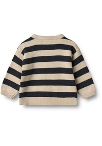 Beige och marinblå randig stickad tröja med rund halsringning och ribbade ärmslut, i en lös och boxig form. Mjuk textur genom hela plagget.
