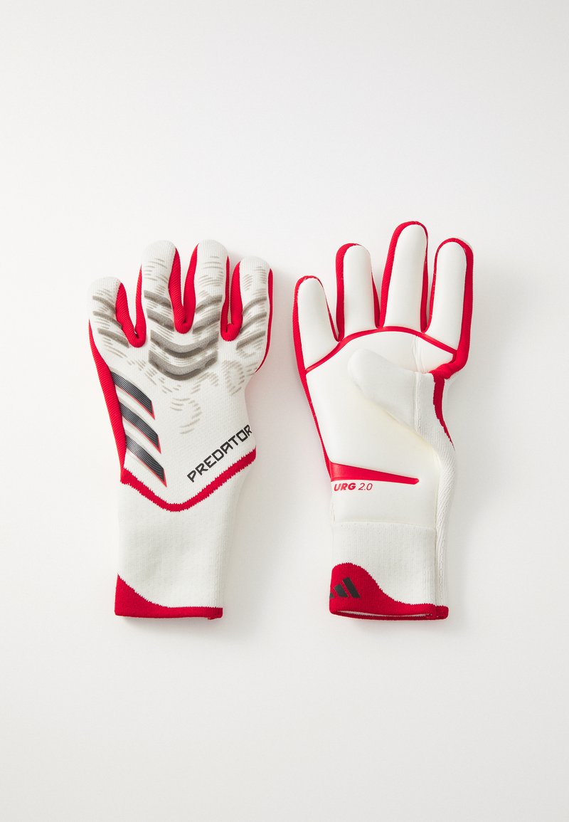 Gants de gardien de but blancs avec des accents rouges. Grip texturé gris sur les bouts des doigts, pouce renforcé et poignet élastique pour un ajustement sécurisé.