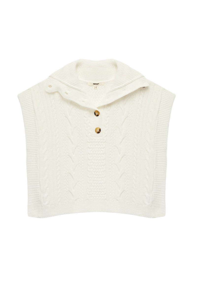 Witte gebreide poncho met een kol, voorzien van een kabelgebreide patroon, drie houten knopen en korte mouwen. Zachte textuur, boxy vorm.