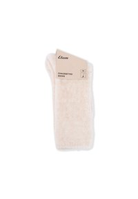 Calcetines rosas difusos hechos de material suave, con un puño doblado. La etiqueta dice "Etam, Chaussettes, TU." Diseño simple sin patrones.