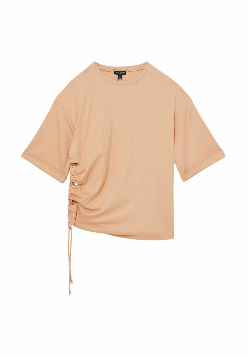 ferskenfarvet T-shirt med korte ærmer, der har en sidelæggedetalje og justerbar snøring, lavet af blødt, letvægtigt stof.