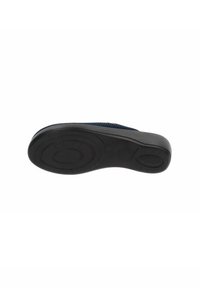 Suola in gomma nera con forma arrotondata. Dettagli di superficie testurizzati, caratterizzati da un motivo di grip circolare. Design sotto il piede che migliora trazione e supporto.