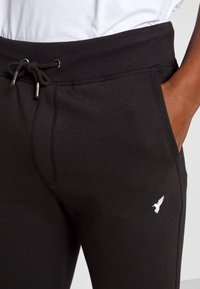 Pier One Tracksuit bottoms - black