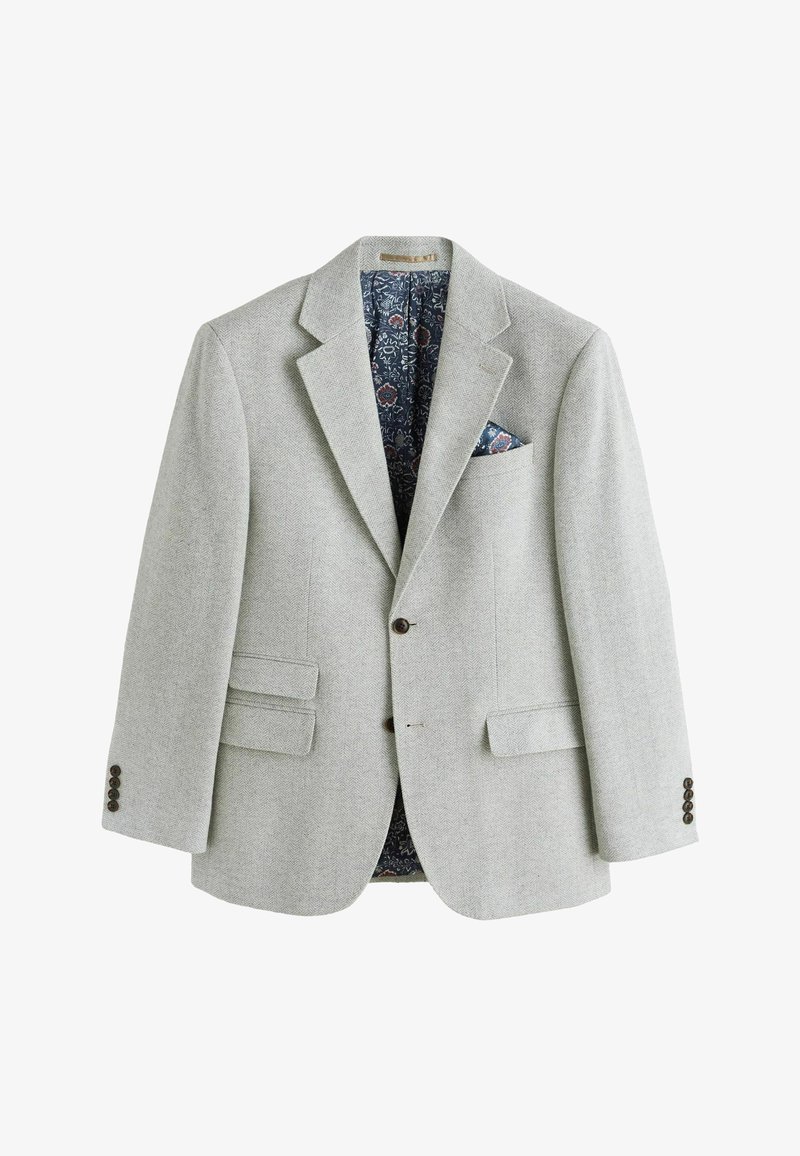 Veste pour homme gris clair en chevrons avec deux boutons, revers crantés, poches à rabat et un mouchoir de poche ainsi qu'une doublure à motif floral.