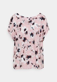 Blouse rose à manches courtes avec un motif floral blanc, noir et marron, coupe ample et col rond.
