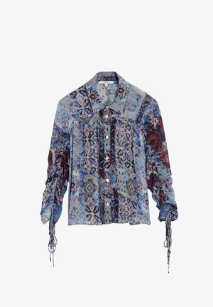 Blusa de manga larga con botones, estampados florales y geométricos multicolores, mangas fruncidas y detalles de lazos en los puños.