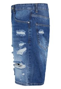 Denim rok met een distress ontwerp, kleurverloop van licht naar donkerblauw, rafelige randen, meerdere scheuren en traditionele vijf-pocket styling.