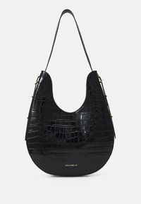 Czarna torebka damska z wytłoczonej skóry krokodyla o zaokrąglonym kształcie, z pojedynczym paskiem na ramię i złotymi akcentami.