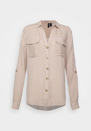 Long-sleeve beige and white vertical striped button-up shirt with two chest pockets and collar, displayed on plain background.