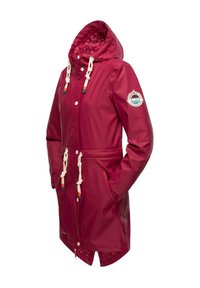 Red waterproof raincoat with a hood, drawstring details, and side pockets; features a patterned interior lining and logo patch on sleeve.