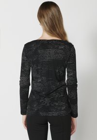 Koroshi Langarmshirt -    black