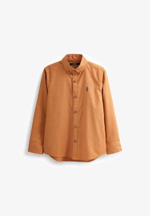 Langærmet brun skjorte med knapper, knaplukket krave og lille mørk broderet hjertelogo på brystet.