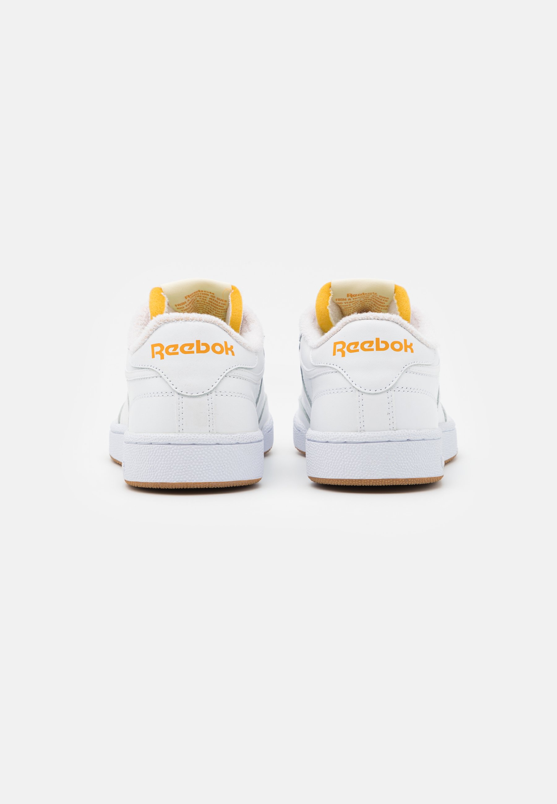 yellow reebok trainers
