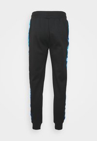 Ellesse Teplákové kalhoty - black