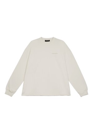 Camisola de algodão creme de mangas longas com gola redonda, corte descontraído e impressão sutil do logótipo no peito. Textura suave e punhos canelados.