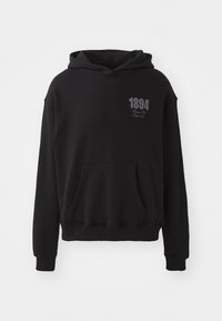 Sweatshirt à capuche noire en tissu doux avec une poche frontale, arborant un design imprimé avec l'année "1894" en gris sur la poitrine.