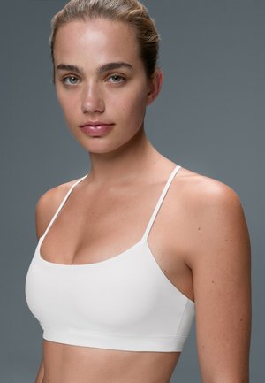 OYSHO, COMFORTLUX LIGHT SUPPORT SPORTS BRA WITH CROSSOVER STRAPS - Sport-BH mit leichter Stützkraft - stone