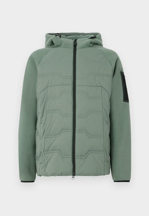 Green padded jacket with a hood, featuring a textured front, zip closure, two front pockets, and a black accent on the left sleeve.