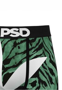 Zaļi un melni bokserbriefi ar tīģera svītru rakstu, baltu logotipa jostu un teksturētu audumu ar sieta sekcijām.