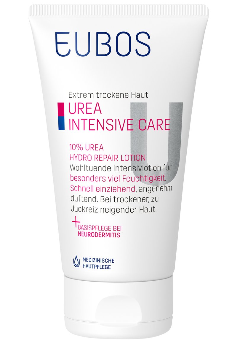 White tube with a pointed top, featuring blue and pink text. Label includes "Urea Intensive Care" and mentions 10% urea for dry skin.