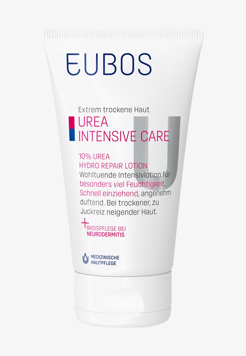White tube with a pointed top, featuring blue and pink text. Label includes "Urea Intensive Care" and mentions 10% urea for dry skin.