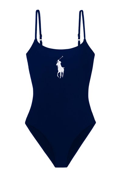 Ολόσωμο μαγιό σε ναυτικό μπλε χρώμα με λεπτές ρυθμιζόμενες τιράντες και λευκό λογότυπο παίκτη πόλο στο κέντρο του στήθους.