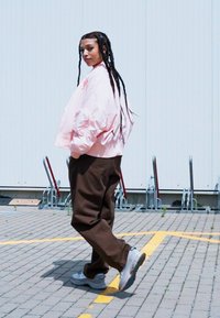 Nike Performance FRANCE ESSENTIAL - Bomber Jacket - washed coral/light madder root