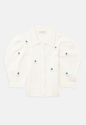 White knitted cardigan with a scalloped collar, buttons, and puff sleeves. Features green and pink embroidered floral accents.