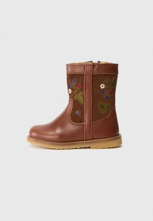 Brown leather ankle boot with floral embroidery on brown suede, a rounded toe, and a tan rubber sole. Side zipper for easy wear.
