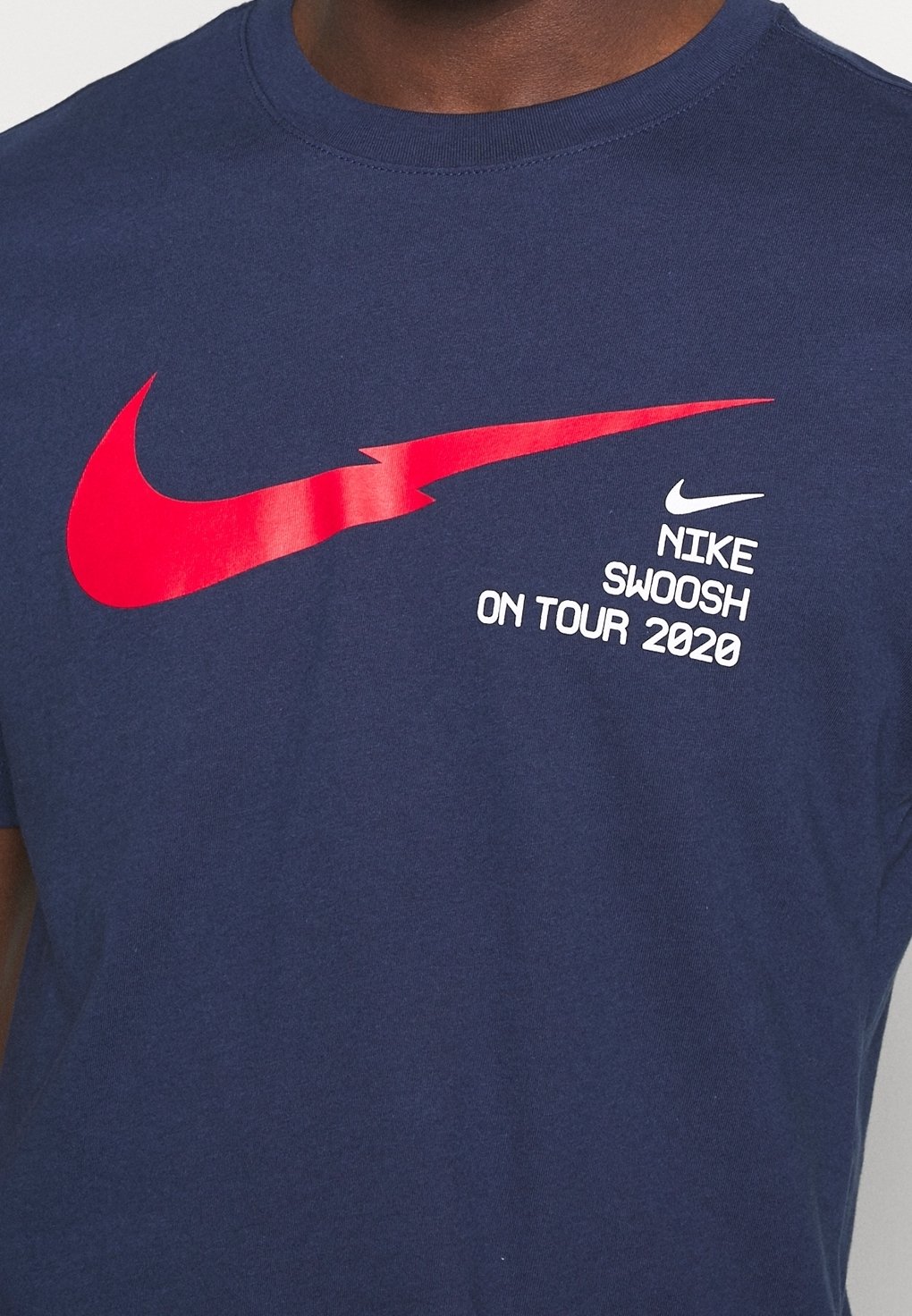 blue and red nike shirt