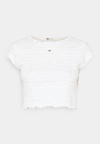 Weißes, gekürztes, gerüschtes Kurzarm-Oberteil mit kleinem Tommy Jeans-Logo, das sich in der Mitte des Ausschnitts befindet, und Rüschen an den Ärmeln und am Saum.