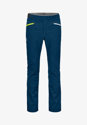 Navy blue pants with a smooth texture, featuring two front zip pockets (one with yellow accents), and a comfortable waistband.