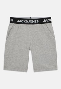 Hallid puuvillased lühikesed püksid musta elastse vöökohaga, millel on "JACK & JONES" logo. Lisaks on neil kaks küljetaskut ja regulaarne lõige.