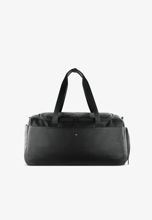 Sac de sport noir en cuir texturé, avec doubles poignées, fermeture éclair, et un petit logo à l'avant. Design lisse et spacieux.