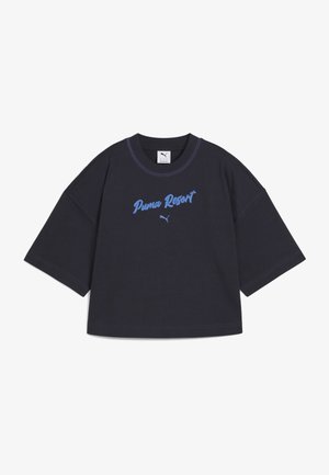 Dark navy oversized t-shirt made of cotton. Features "Puma Resort" in light blue embroidery on the front, with a crew neckline and short sleeves.