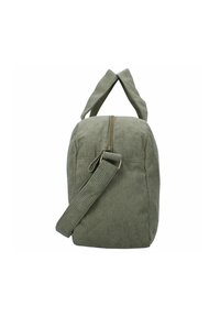 Πράσινη καπιτονέ τσάντα με φερμουάρ στο πάνω μέρος, διπλές λαβές και ρυθμιζόμενος ιμάντας ώμου, εμφανίζεται από το πλάι σε λευκό φόντο.